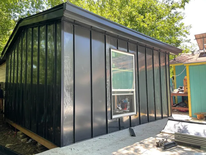 Black standing seam metal wall panels for Metal Roof Installation in Jordan