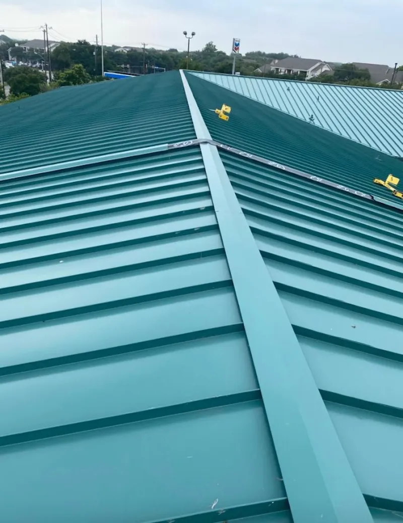 Green commercial metal roof ridge and valley for Metal Roof Repair in Jordan